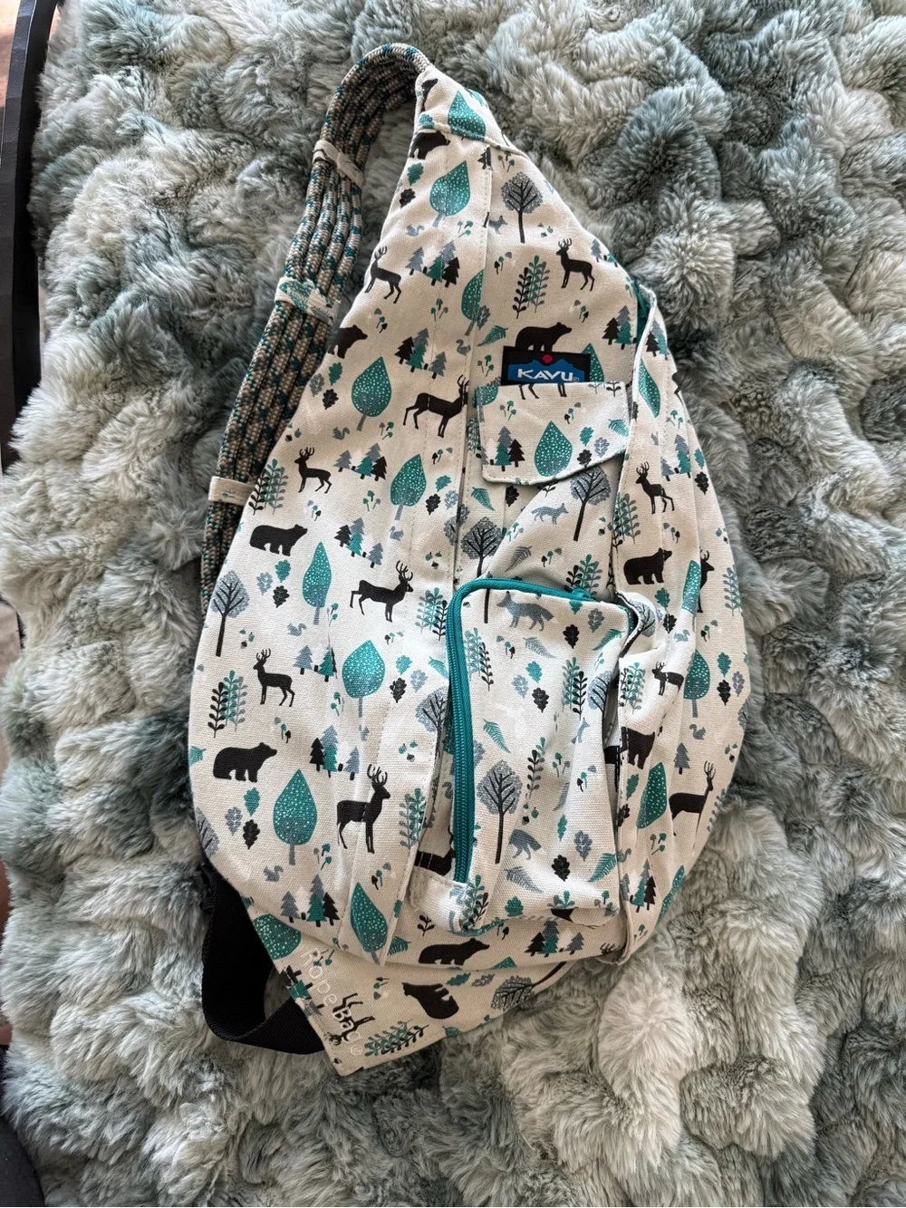 Kavu  Forest Print Sling Bag in Teal and Cream